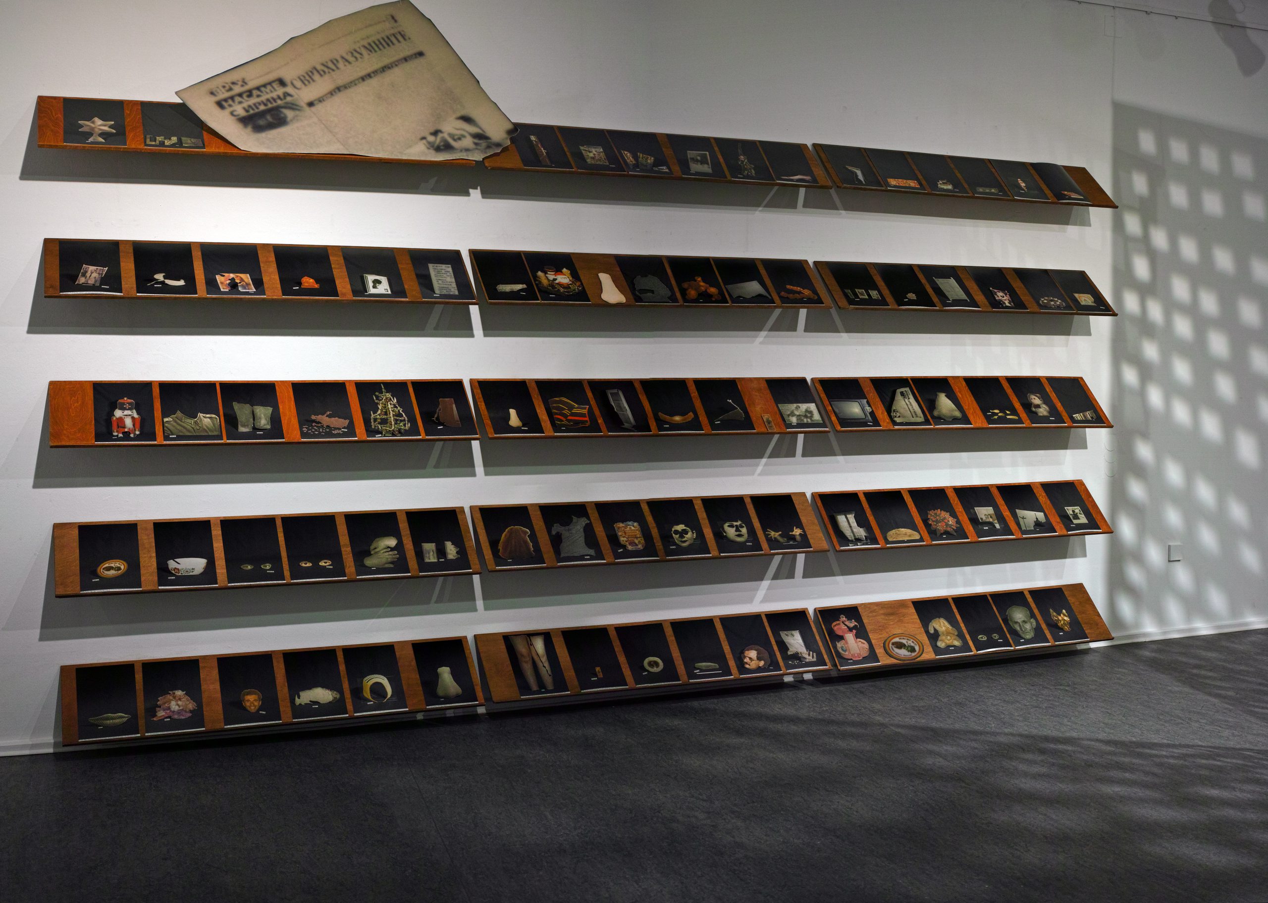 Beatrice Moumdjian, Forensic Excavations Inventory or The Total Deconstruction of an Armenian Family, 2017-2024, installation: photo prints, hand-cut objects, shelves (c) Lars Preisser